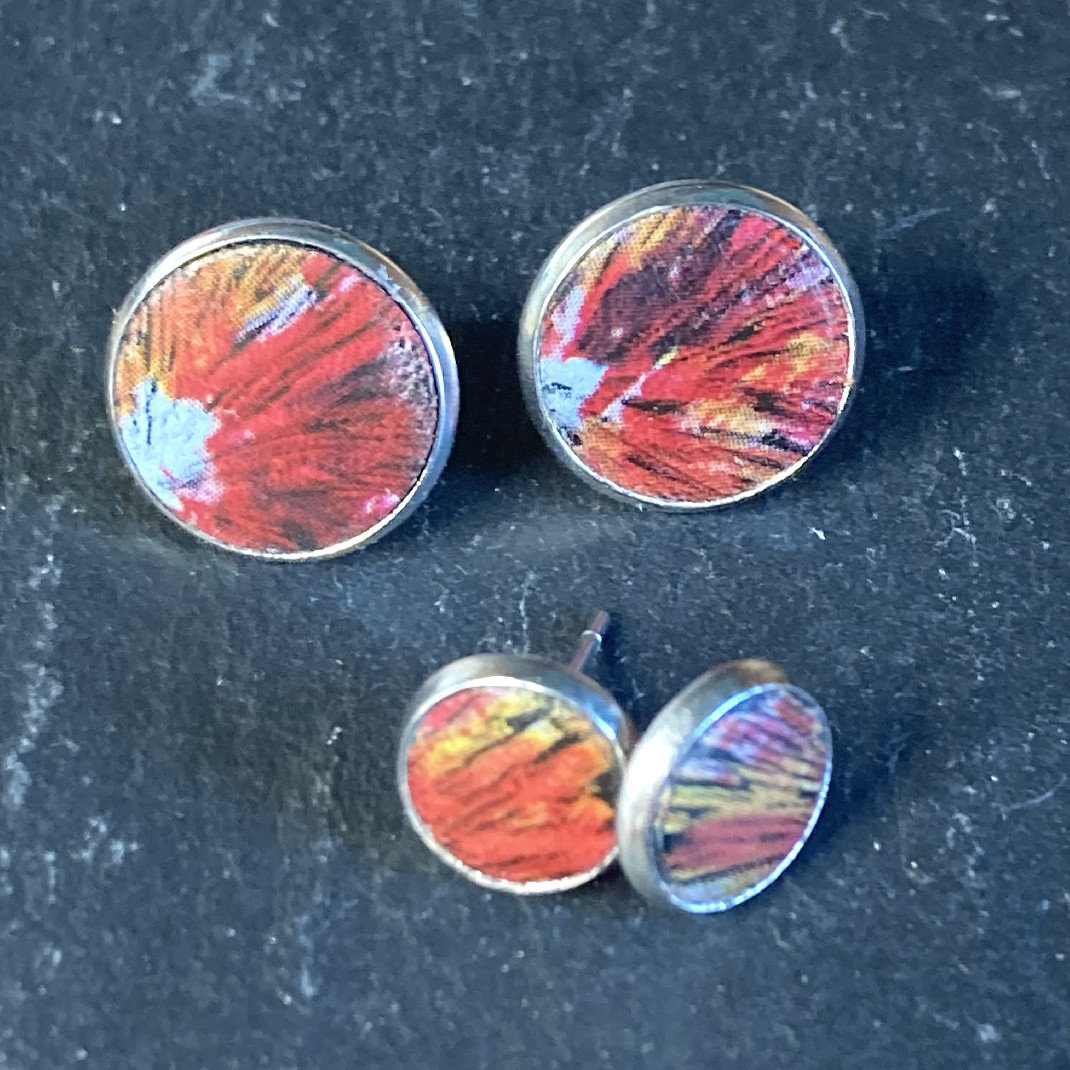 Clou d'oreilles motif orangé